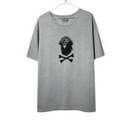 Urban Cult grey cotton t-shirt with BAPE Pirate Head logo and crossbones graphic, size XL.