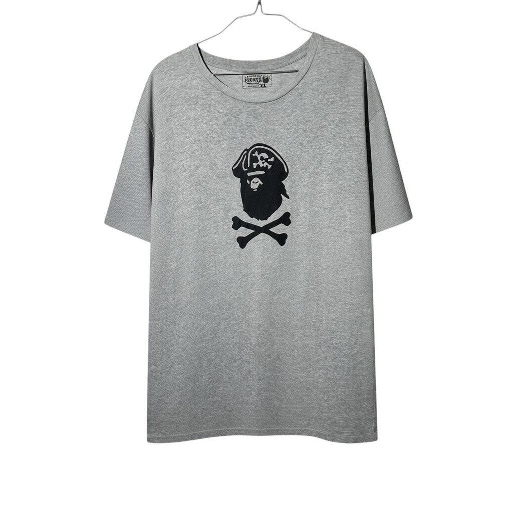 Urban Cult grey cotton t-shirt with BAPE Pirate Head logo and crossbones graphic, size XL.