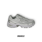 Sneaker Urban Cult New Balance 740 in mesh bianco e dettagli riflettenti argento metallizzato, stile tech-running