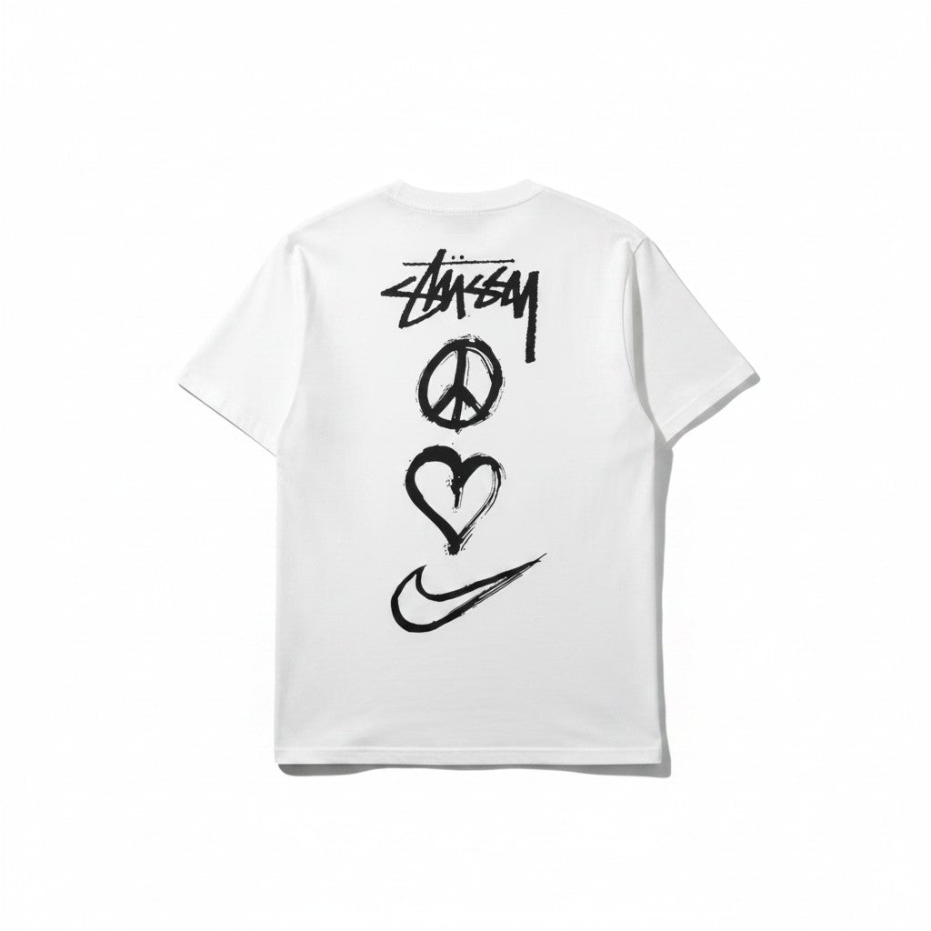 Urban Cult white cotton t-shirt with Nike x Stüssy 'Peace, Love, Swoosh' graphic print on back.