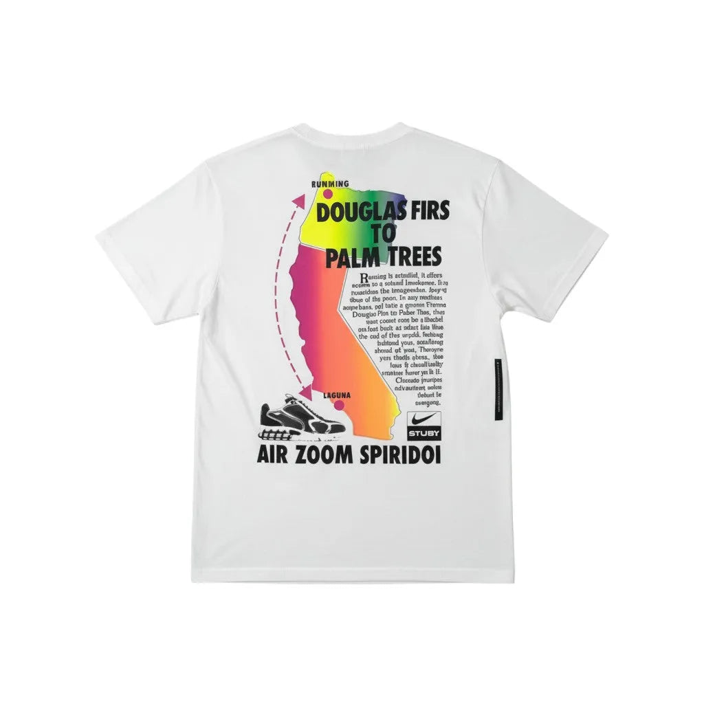 Urban Cult white cotton t-shirt with multicolor 'Douglas Firs to Palm Trees' graphic, Nike Air Zoom Spiridon shoe, and Stüssy logo.