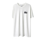Urban Cult white cotton t-shirt with Nike x Stüssy 'Spiridon' graphic and multicolor accents.