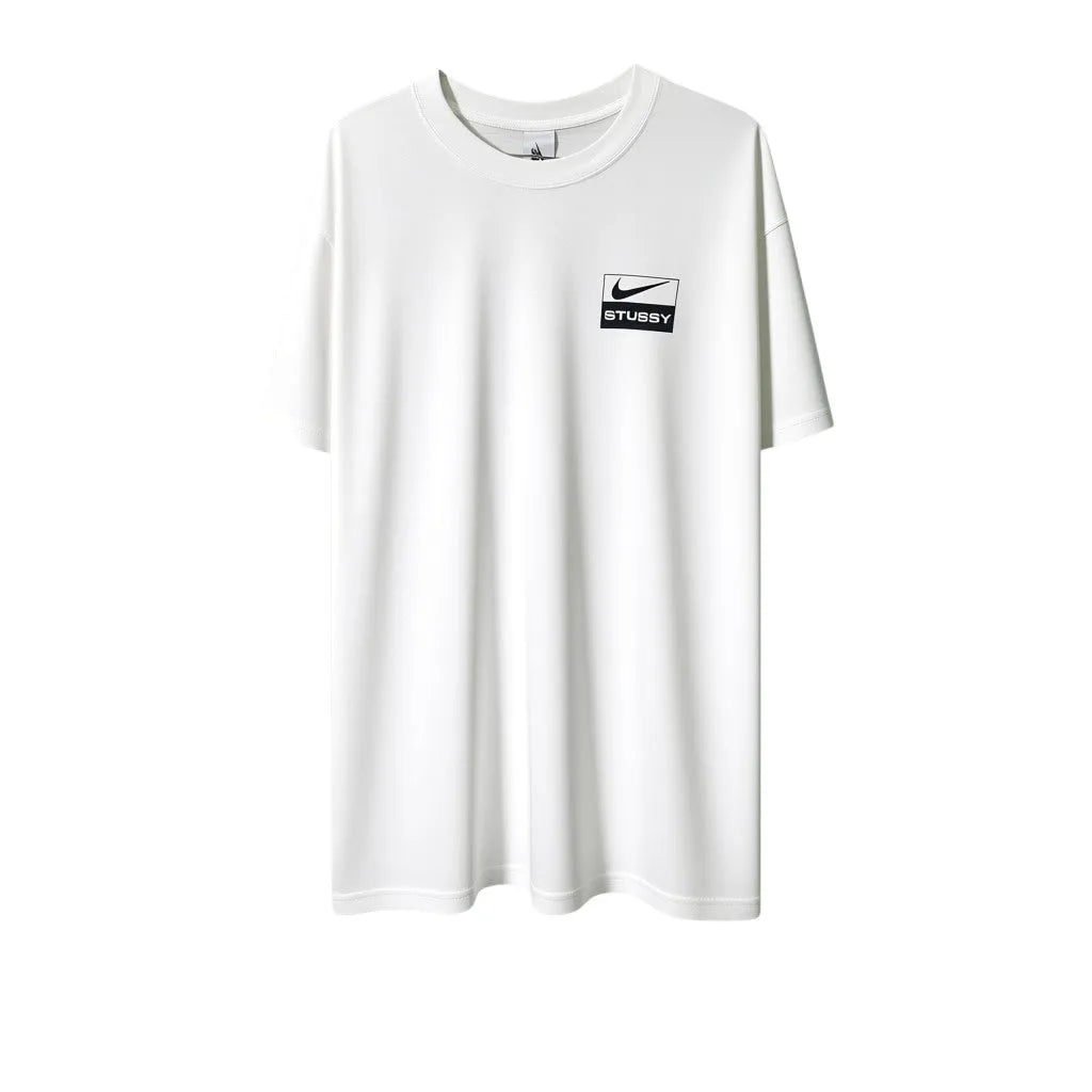 Urban Cult white cotton t-shirt with Nike x Stüssy 'Spiridon' graphic and multicolor accents.