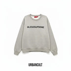 Felpa Urban Cult Supreme Bless Crewneck grigio melange in cotone pesante con grafica ricamata sul petto.