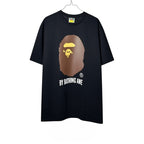 Urban Cult T-Shirt BAPE A Bathing Ape Nera in cotone con iconico logo Ape Head marrone e giallo.