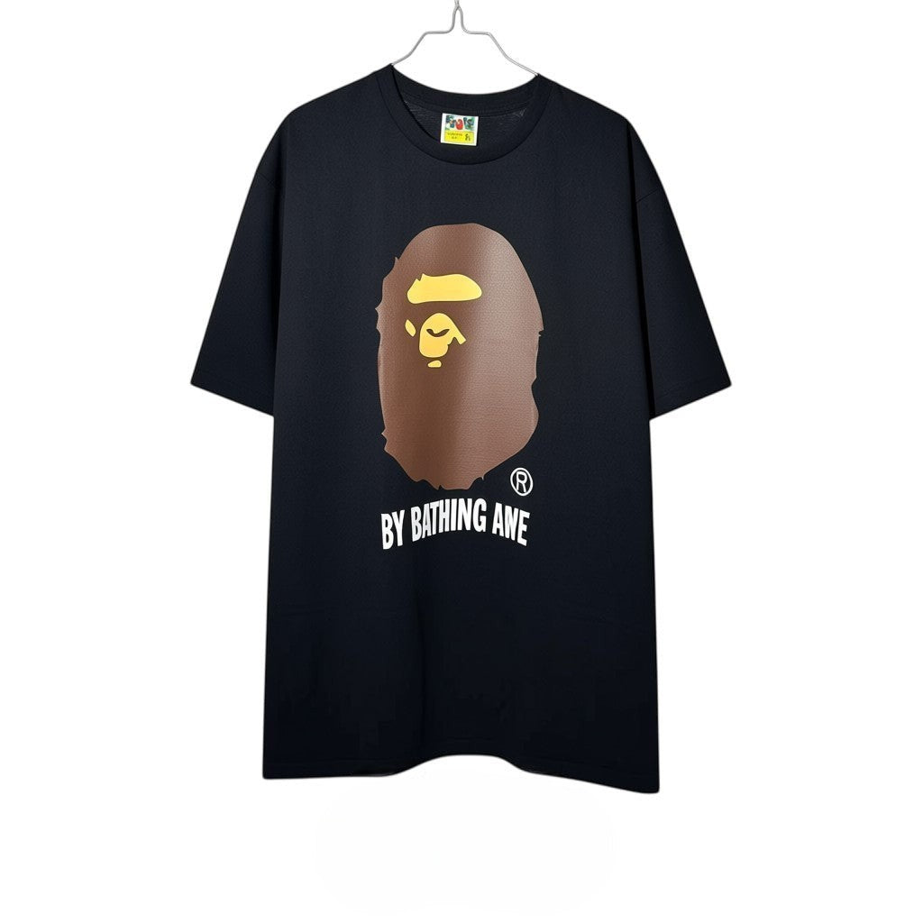 Urban Cult T-Shirt BAPE A Bathing Ape Nera in cotone con iconico logo Ape Head marrone e giallo.