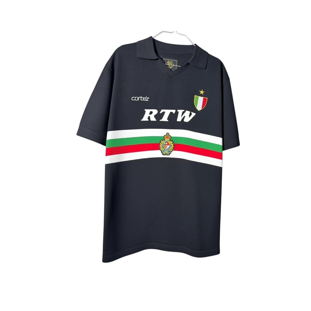 Urban Cult black knit jersey with white, green, and red stripes and 'RTW' logo. Features a vintage football aesthetic.