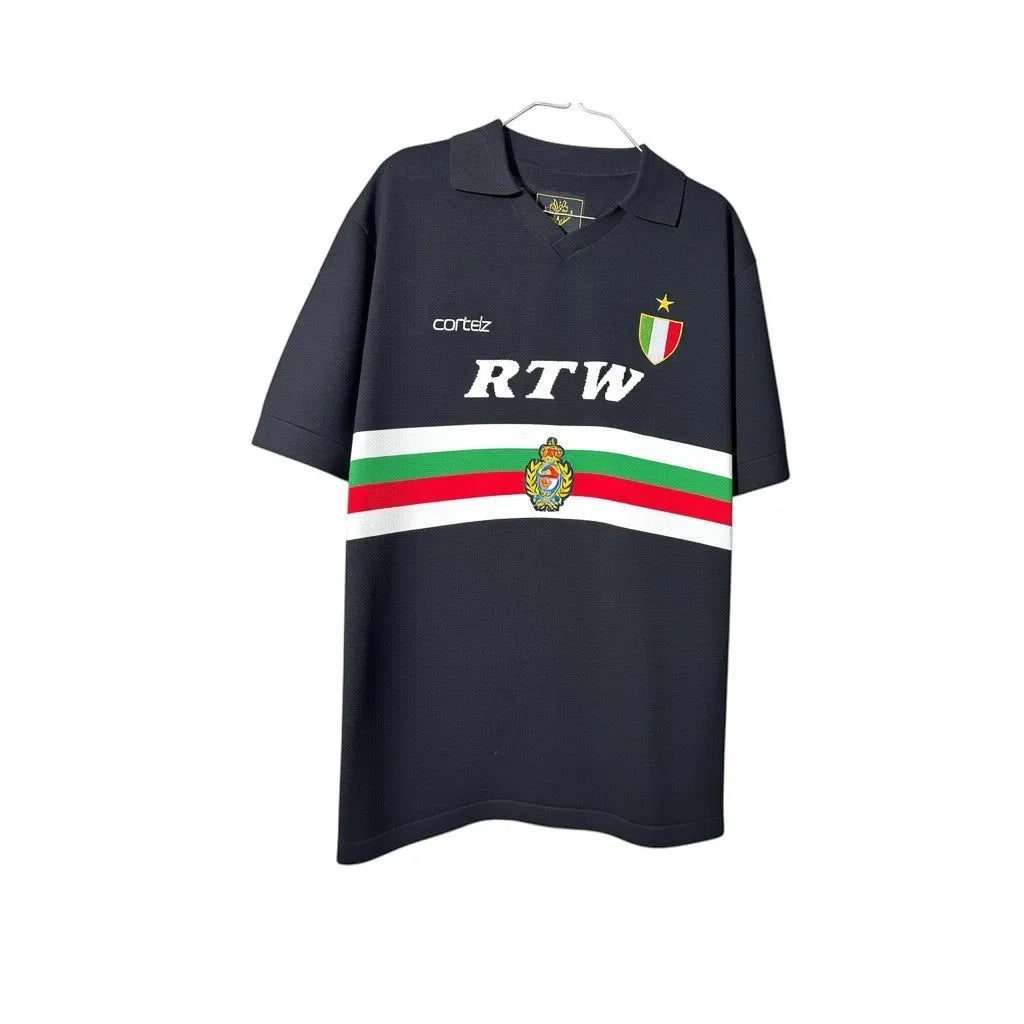 Urban Cult black knit jersey with white, green, and red stripes and 'RTW' logo. Features a vintage football aesthetic.