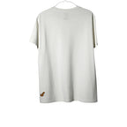 Urban Cult white cotton t-shirt with KAWS x Uniqlo Sesame Street Companion Outline graphic on front