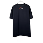 Urban Cult black cotton t-shirt with KAWS x Andy Warhol graphic print on back, size XL.