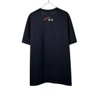Urban Cult black cotton t-shirt with KAWS x Andy Warhol graphic print on back, size XL.