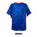 Urban Cult Maglia Home Francia 2021/2022 blu cobalto con dettagli rossi sul colletto e sui lati, fantasia floreale blu.