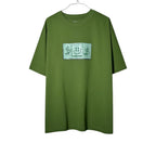 Urban Cult olive green cotton t-shirt with CPFM SpongeBob "Dollar" graphic print on chest.