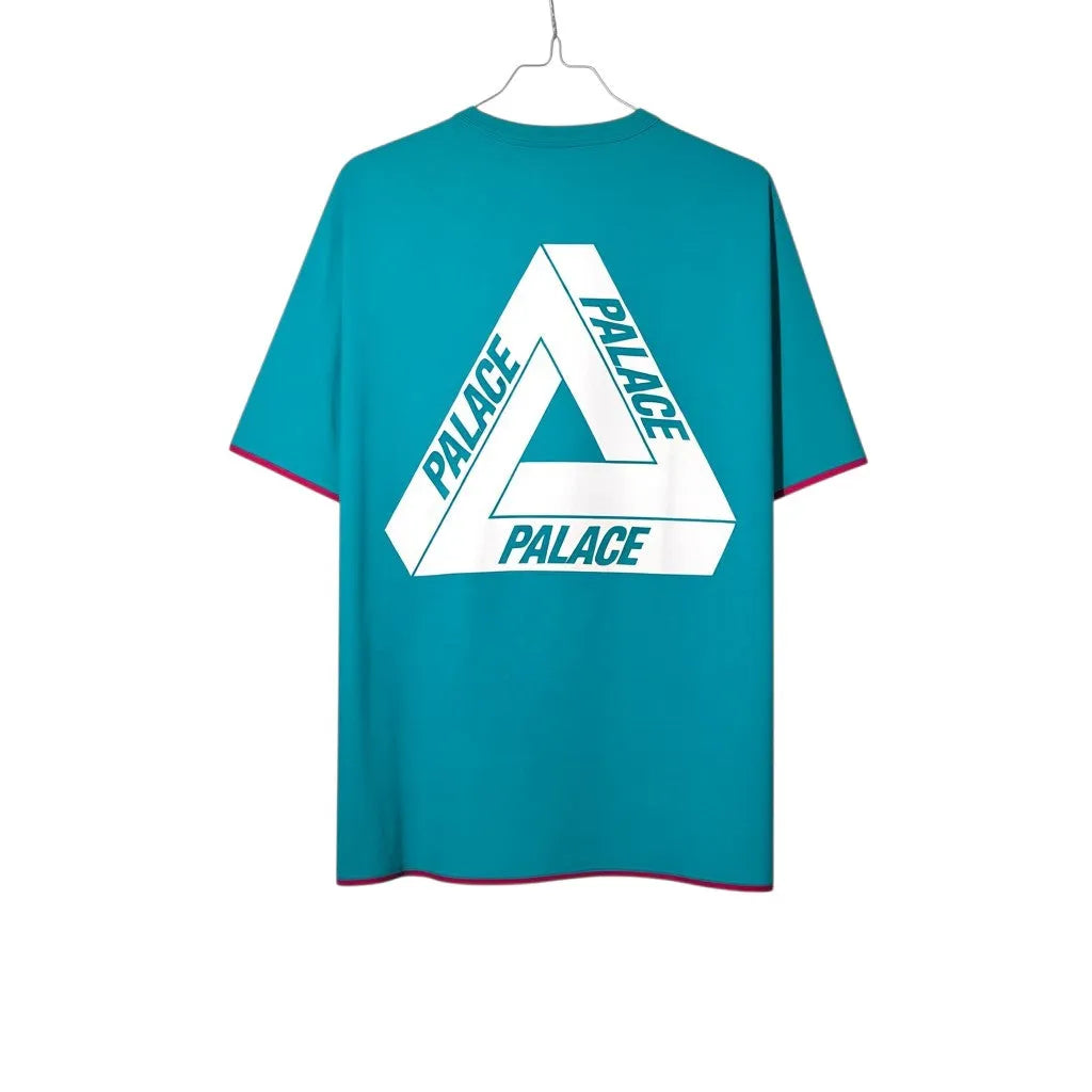 Urban Cult men's size M reversible t-shirt in teal with large white Tri-Ferg logo on back. Cotton.