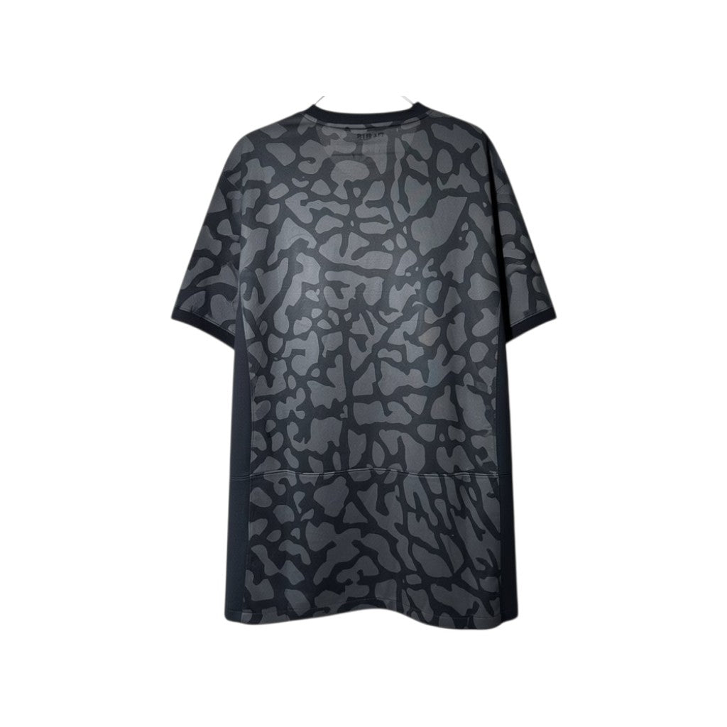 Maglia Ufficiale Jordan PSG Third Kit 2023/2024 nera e grigia con stampa "elephant print" camo